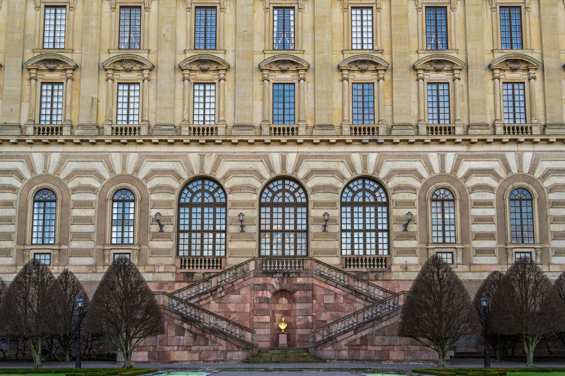 Exterior of the historic Royal Palace in Stockholm showcasing baroque architecture.